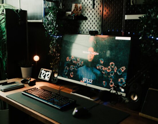 Wireless keyboard on a home office desk setup for working from home