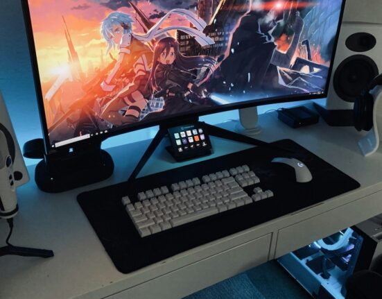 Best keyboard and mouse combo in Canada set up beside a computer monitor