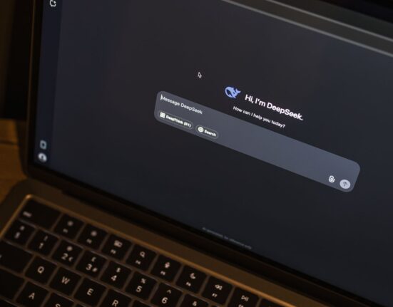 Laptop showing an AI chat interface, illustrating AI model bundles versus separate subscriptions
