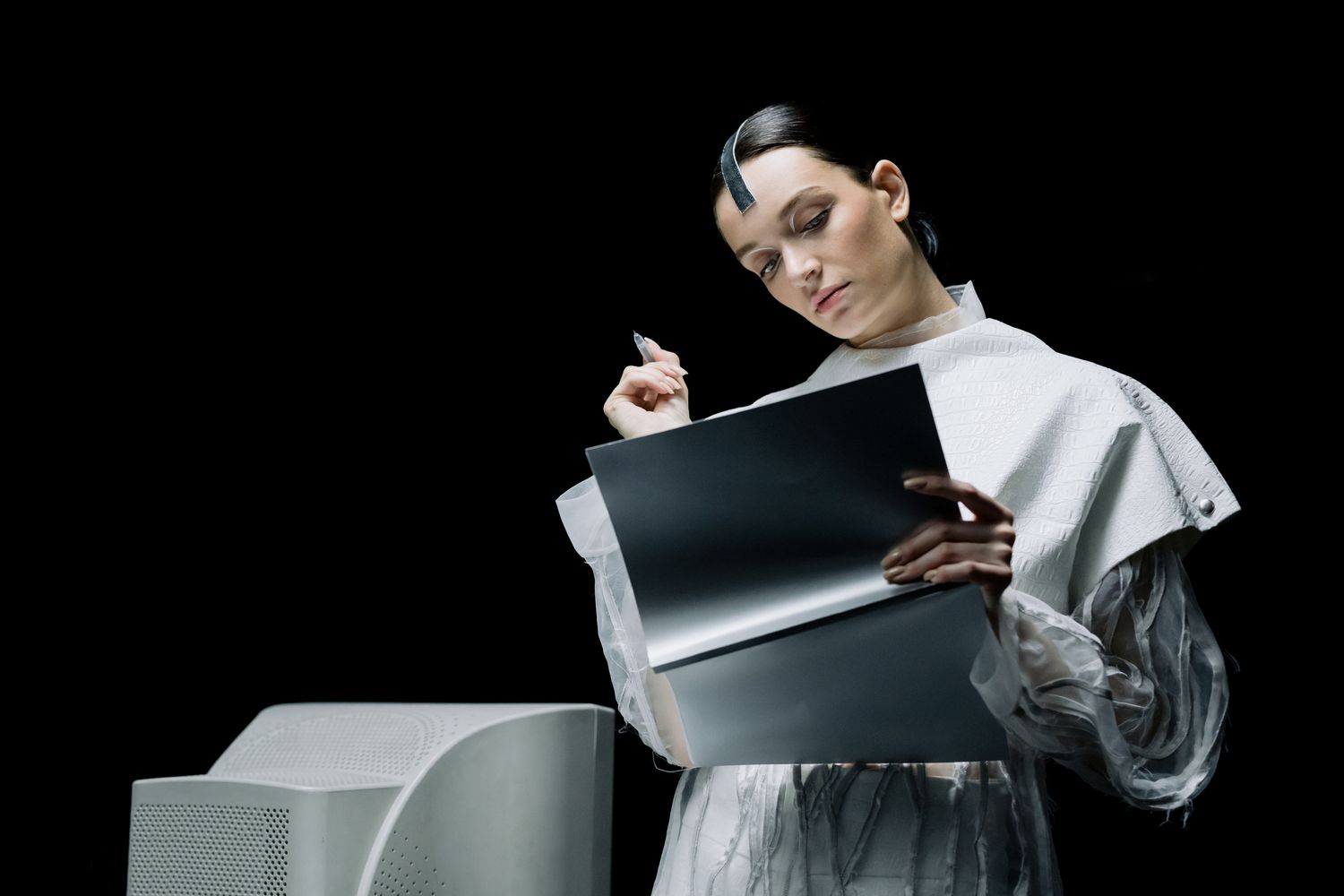 Researcher reviewing notes to verify a cited AI-generated research report