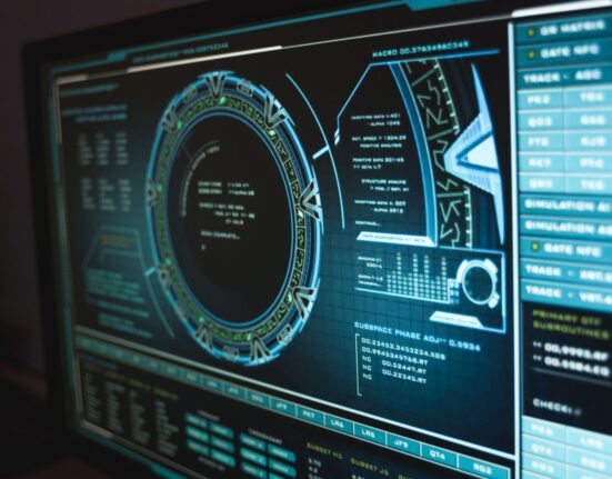 Person studying a computer screen to decide between antivirus vs internet security suite