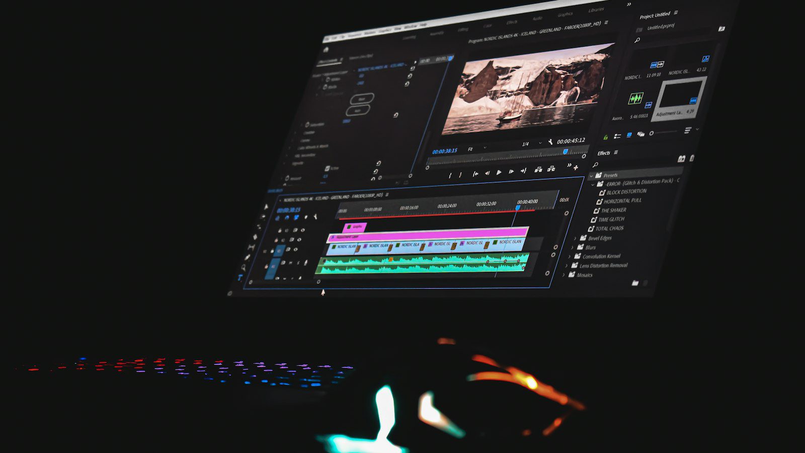 Video editing timeline on a monitor illustrating free tier video export limits in the UK