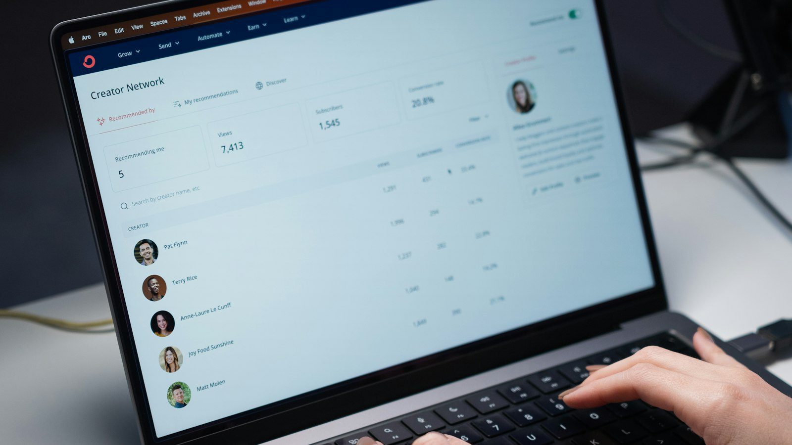 Laptop keyboard on a desk used to review inbox cleanup app features and mailbox permissions