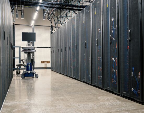 Server racks in a data center illustrating managed hosting vs VPS