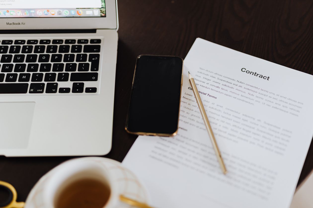 Laptop, smartphone and contract document reviewing software lifetime license terms