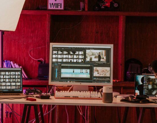 Video editing workspace with monitors and keyboard, ideal for beginners choosing video editing software in the UK