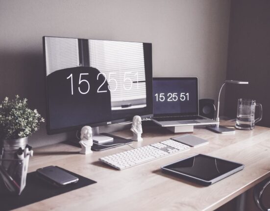 Computer on a desk running an online store on WordPress hosting